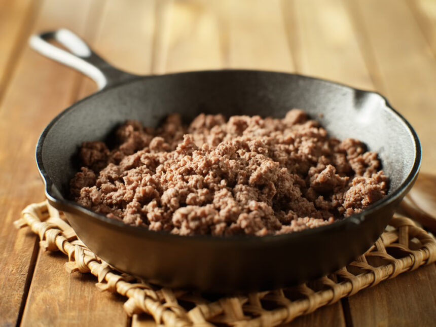 browned ground beef in cast iron skillet